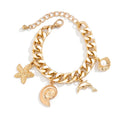 Gold-toned chunky chain bracelet with conch dolphin starfish charms from boho choker necklace bracelet set