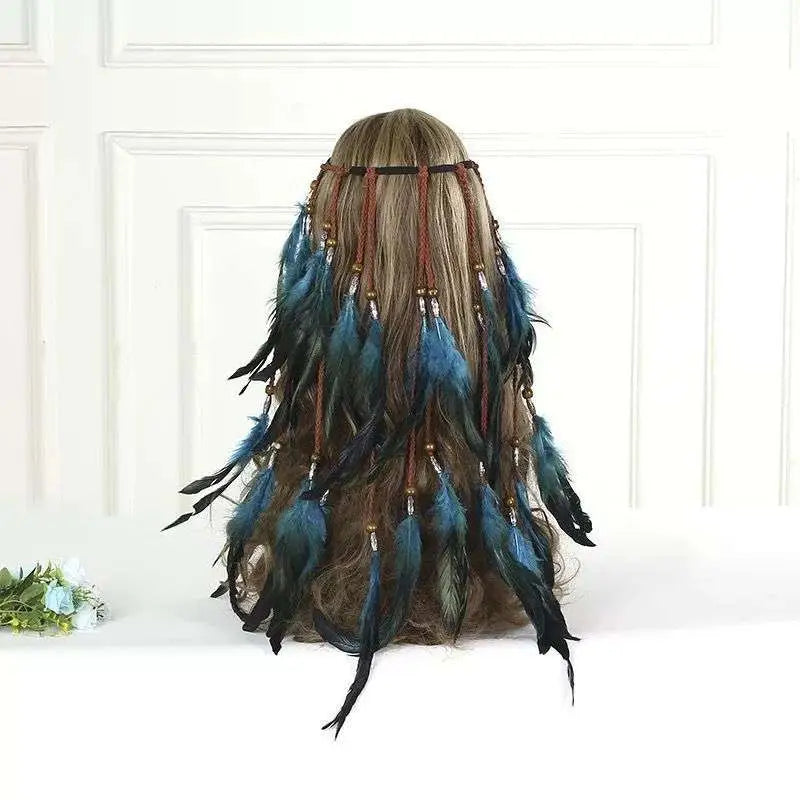 Boho fashion feather headband ornament with reddish brown mane, braided strands, pink feathers, and wooden beads