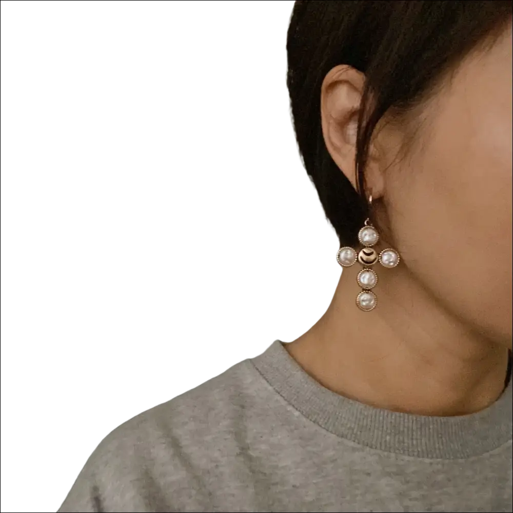 Gold-toned cross earrings adorned with round pearls ideal for luxury women’s fashion accessories and plus size dresses bikinis