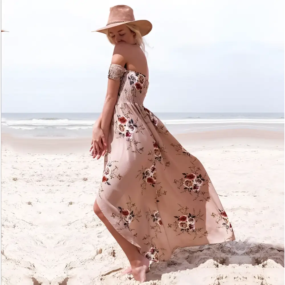 A boho style long off the shoulder maxi dress women floral in soft beige with intricate embroidery and flowing fabric