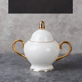 White ceramic sugar bowl with gold accents from elegant white bone china coffee cup and saucer afternoon tea set