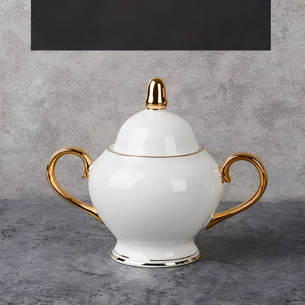 White ceramic sugar bowl with gold accents from elegant white bone china coffee cup and saucer afternoon tea set