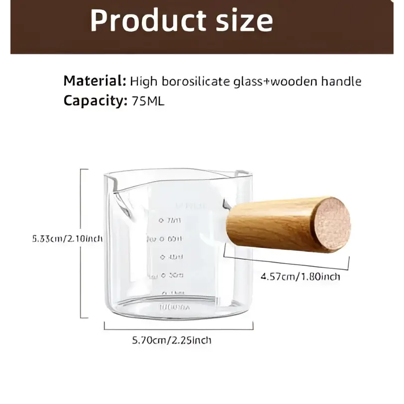 Clear borosilicate glass espresso measuring cup with wood handle and milliliter markings for precise use