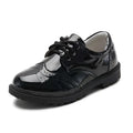 Boys black patent leather shoes with brogue detail featuring a glossy finish and classic casual single style lace-up design