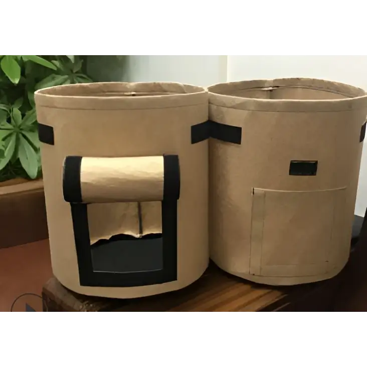 Brown breathable potato tomato vegetable plant growth bags with black trim and front pockets for gardening use
