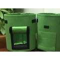 Green felt breathable potato tomato plant growth bags with black trim and roll-up front panel for tomato vegetable plants