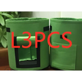 Green felt breathable potato tomato vegetable plant growth bags with black trim and front pockets for planting