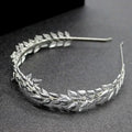Bridal golden leaf headband featuring delicate silver alloy crown with intricately crafted metal leaves on slender frame