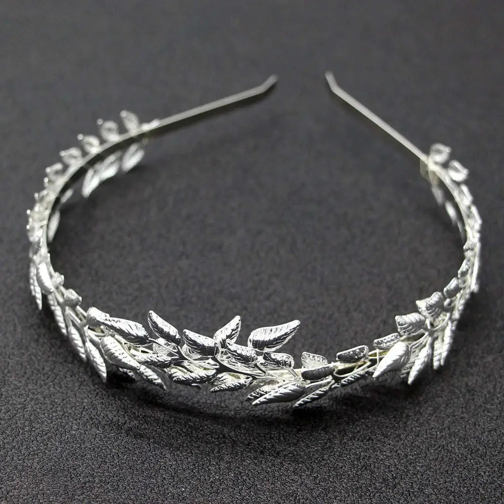 Bridal golden leaf alloy crown featuring a silver leaf-patterned headband with intricate foliage design