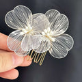 Elegant white wirework bridal headdress super fairy golden flower comb with delicate pearl centers and gold-toned teeth