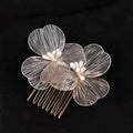 Delicate silver wirework bridal headdress with two fairy golden flower combs featuring pearl-like centers