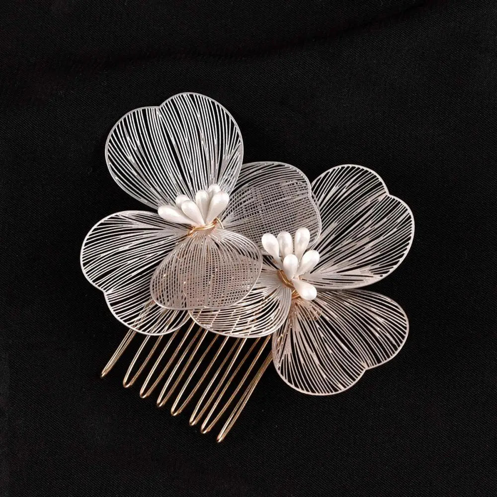 Delicate silver wirework bridal headdress with two fairy golden flower combs featuring pearl-like centers