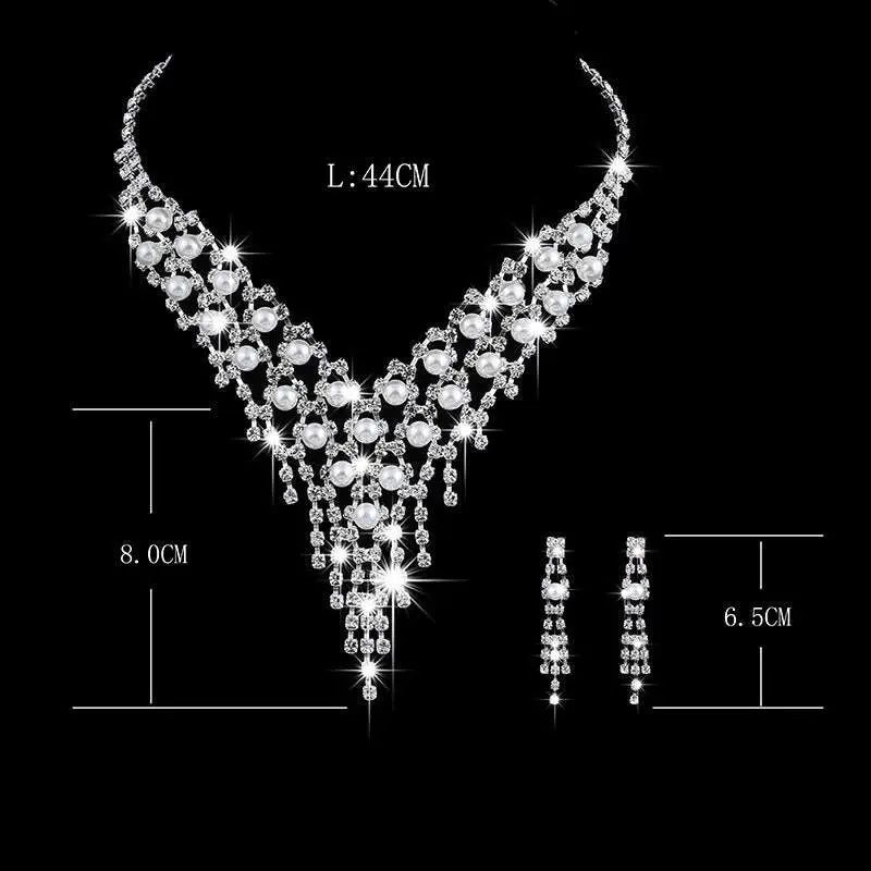 Bridal jewelry set featuring a sparkling silver pearl rhinestone necklace with a v-shaped cascading design