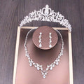 Silver bridal rhinestone crown with intricate floral design and sparkling crystal embellishments in crown necklace set