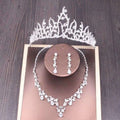 Silver bridal rhinestone crown with intricate floral design and sparkling rhinestones in crown necklace set