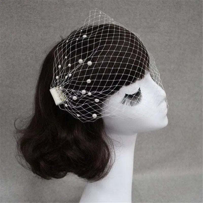 White bridal veil pearl mesh hair comb with large hole mesh and delicate pearl accents for bridal use