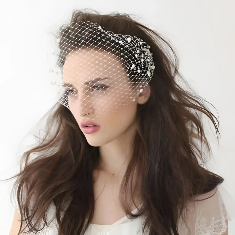 Delicate white bridal veil pearl mesh hair comb with large hole mesh design and pearl accents for bridal use