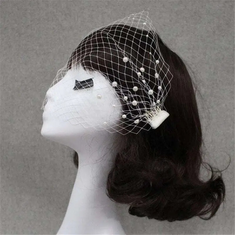White lace bridal veil pearl with large hole mesh design secured by elegant mesh hair comb for bridal use
