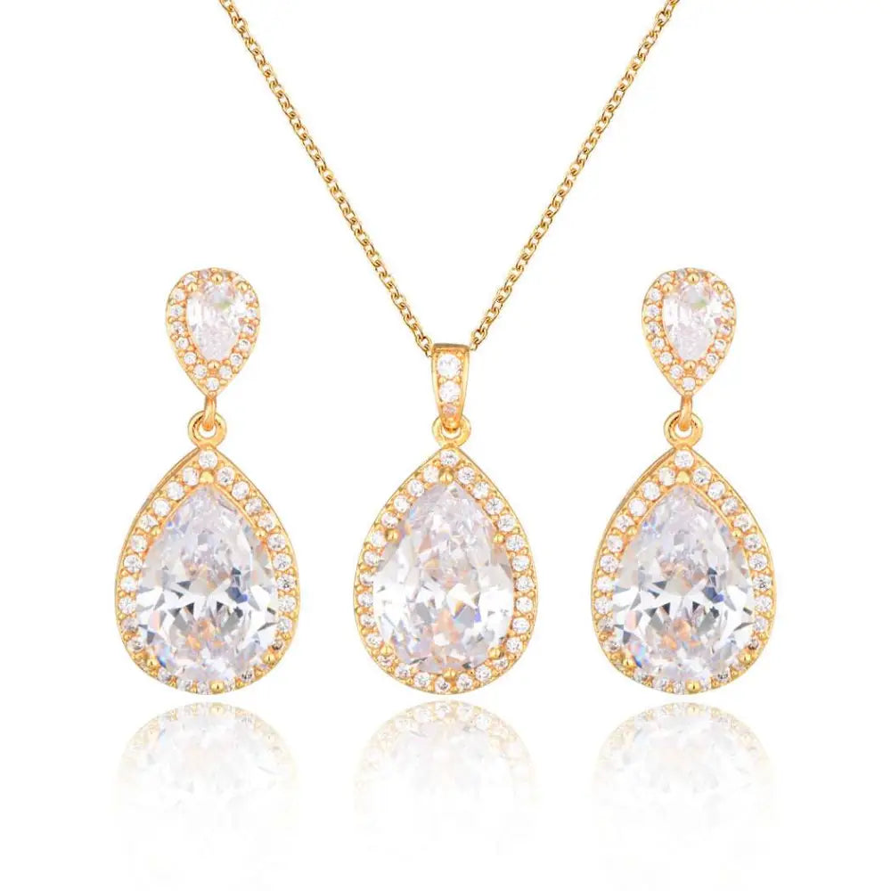 Gold-toned bright big zircon water drops pendant necklace and matching earrings set with central clear crystal and pave stones
