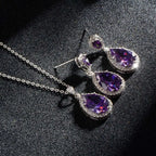Elegant silver-toned bright big zircon jewelry set with teardrop purple amethyst and matching zircon water drops earrings