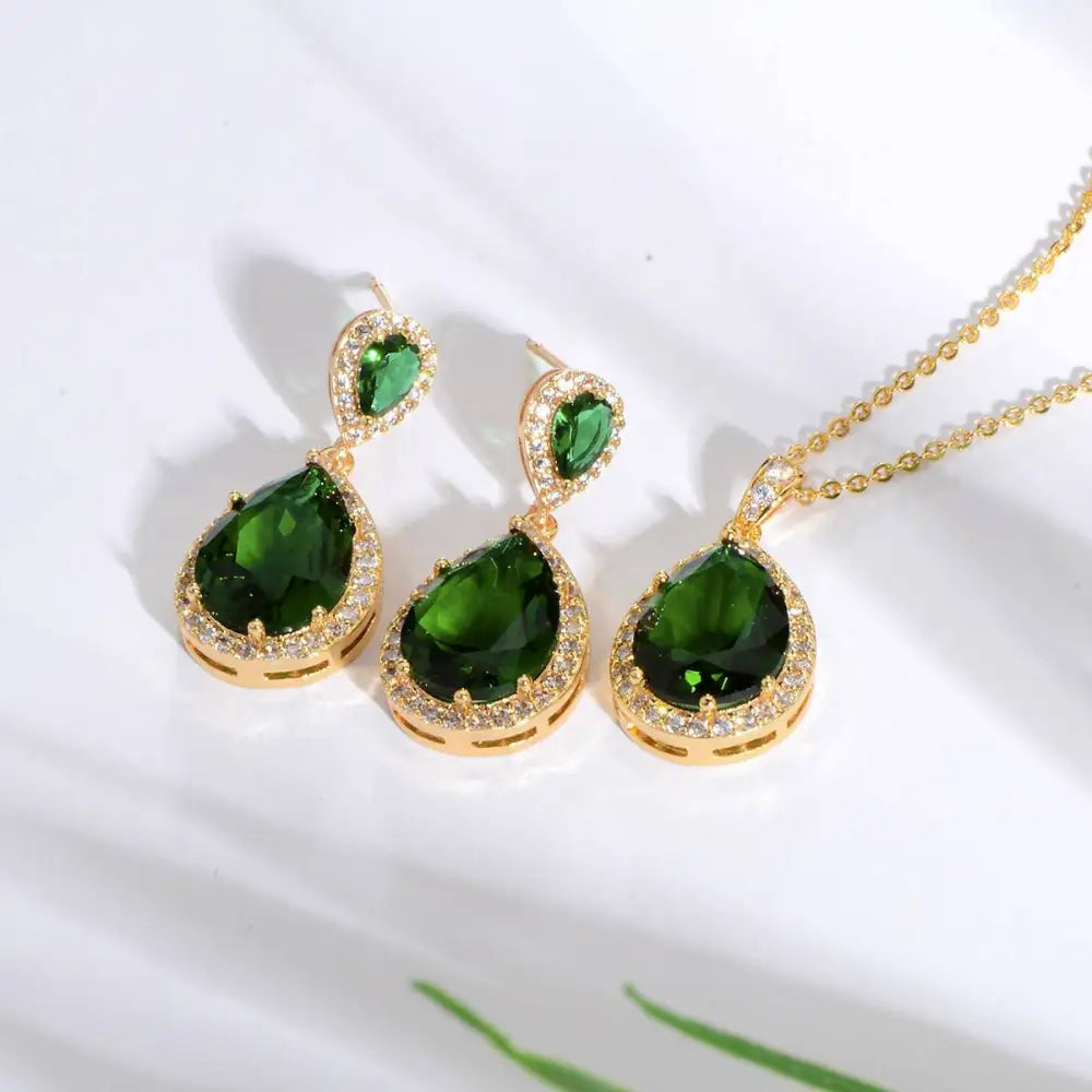 Elegant gold-toned bright big zircon water drops jewelry set with teardrop emerald crystals and matching earrings