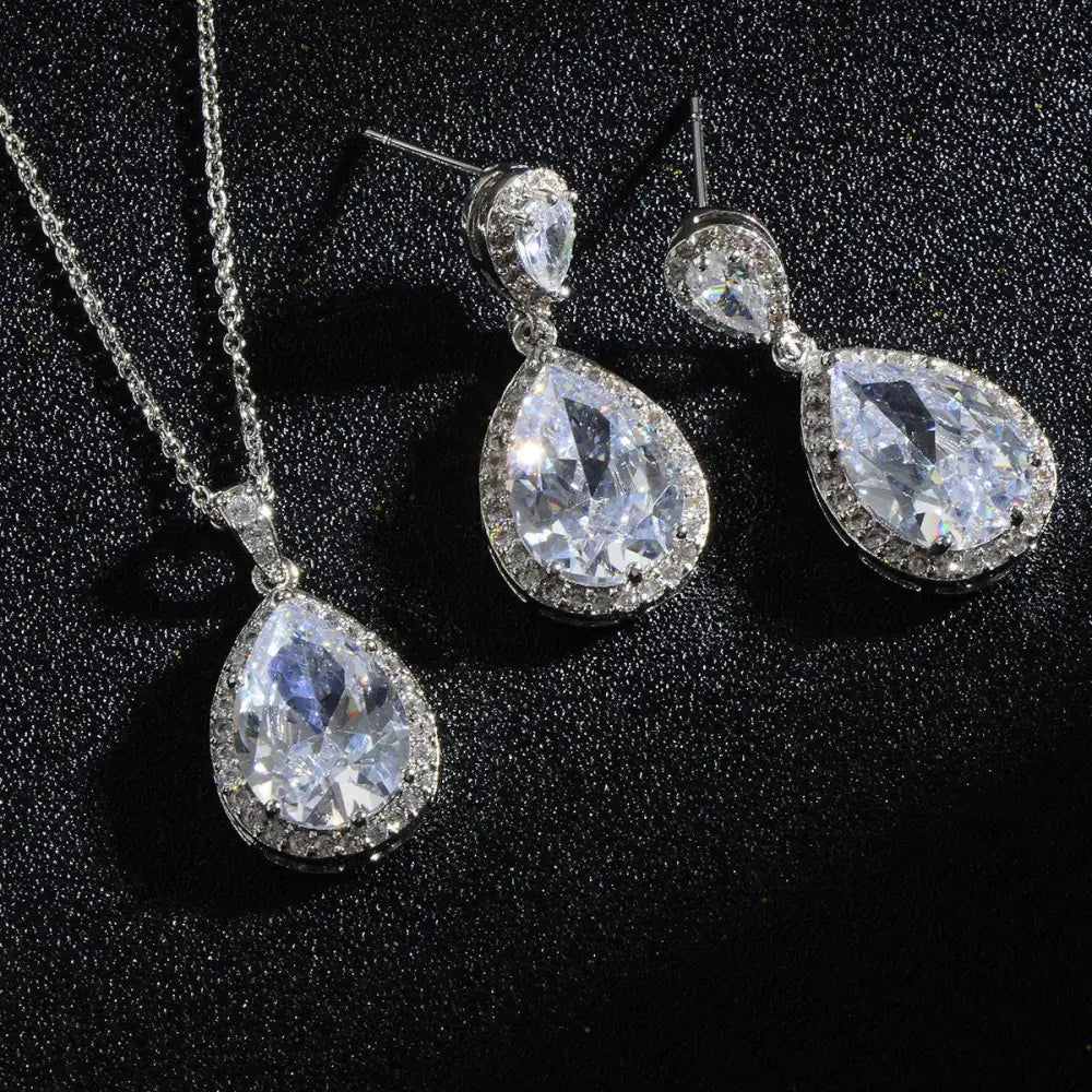 Elegant silver-toned bright big zircon water drops jewelry set featuring teardrop pendant necklace and matching earrings