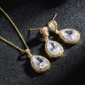 Elegant gold-toned bright big zircon water drops jewelry set with teardrop pendant necklace and matching earrings featuring clear crystals