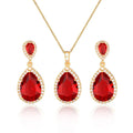 Elegant gold-toned bright big zircon water drops jewelry set with red gemstones and matching earrings encircled by clear crystals
