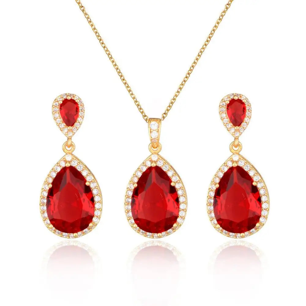 Elegant gold-toned bright big zircon water drops jewelry set with red gemstones and matching earrings encircled by clear crystals