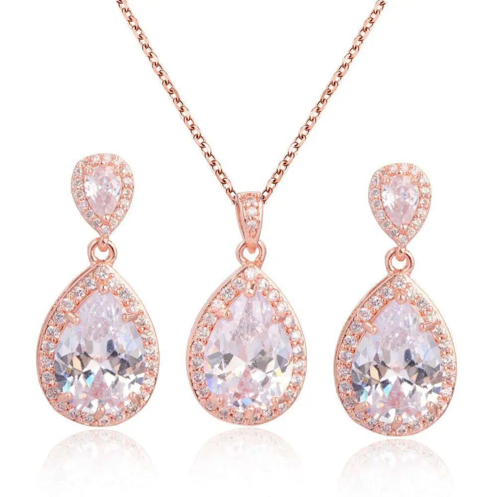 Elegant rose gold bright big zircon teardrop pendant necklace and matching earrings with pink gemstones and clear crystals