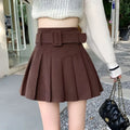 Brown belted corduroy pleated mini skirt with matching belt and rectangular buckle in corduroy half skirt style