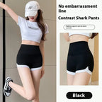 Black contrast shark hip lifting sports shorts with white trim designed for lifting sports and stitching yoga pants