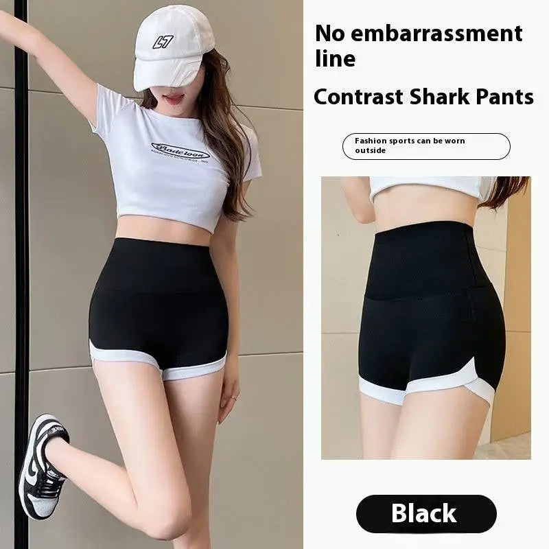 Black contrast shark hip lifting sports shorts with white trim designed for lifting sports and stitching yoga pants
