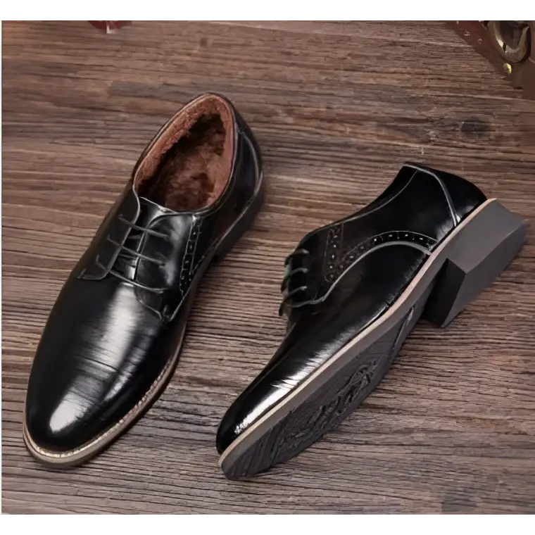 Black leather oxford dress business shoes with polished finish and brogue detailing for formal wear