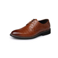 Brown leather oxford dress business shoes with classic brogue pattern and black rubber sole for formal occasions