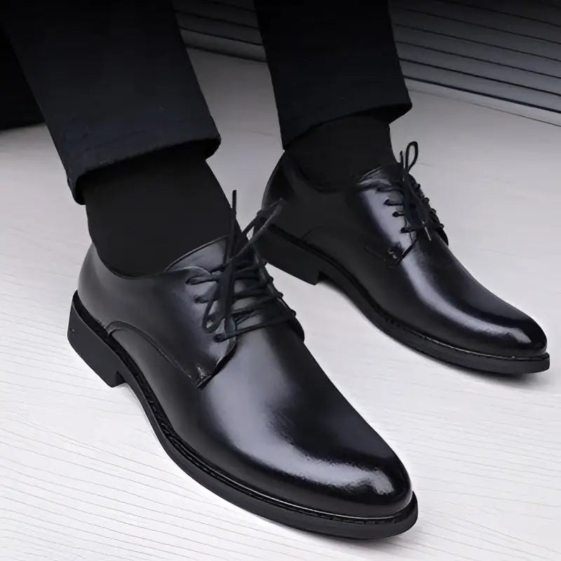 Black leather lace-up dress shoes with polished finish and classic oxford design for luxury women’s fashion