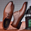 Brown pointed toe leather shoes for men with luxury style featuring brown leather and black sole and laces