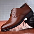 Brown pointed toe leather shoes with black rubber sole and laces ideal for luxury women’s fashion events