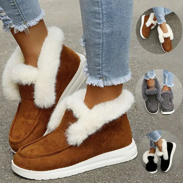 Brown suede warm winter shoes with plush white faux fur trim and thick white rubber sole for cold weather use