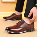 Brown textured work fashion leather shoes featuring brown leather lace-up design with textured panel and black sole