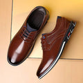 Brown textured work fashion leather shoes featuring brown leather lace-up design with black and white sole accents