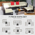 Brown wicker patio furniture set featuring dark brown wicker sofa with beige cushions and red accent pillows outdoors
