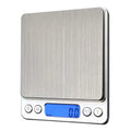 A brushed stainless steel food portable mini pocket scale with a blue lcd display and four control buttons