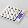 Silver brushed stainless steel food portable mini pocket scale with blue lcd showing 5.30g and chinese buttons