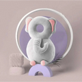Soft gray plush elephant toy with pink ears and feet attached to a bunny ear mesh toddler head protection pad