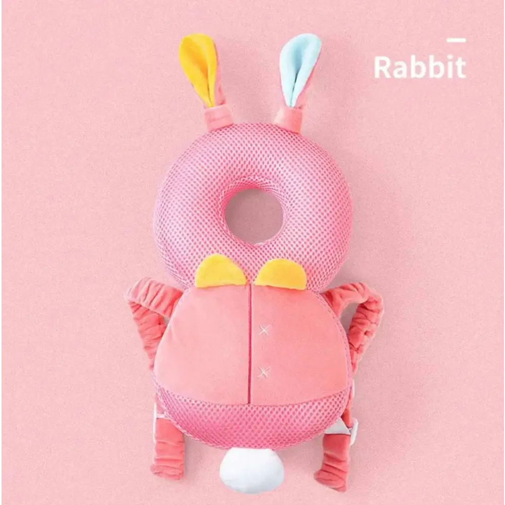 Pink bunny ear mesh toddler head protection pad with yellow and blue ears white tail and soft fabric arms
