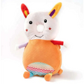 A plush white and orange bunny ear mesh toddler head protection pad with colorful ears and a patterned body