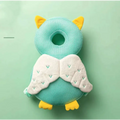 Bunny ear mesh toddler head protection pad in soft teal mesh with yellow felt accents and embroidered white wings