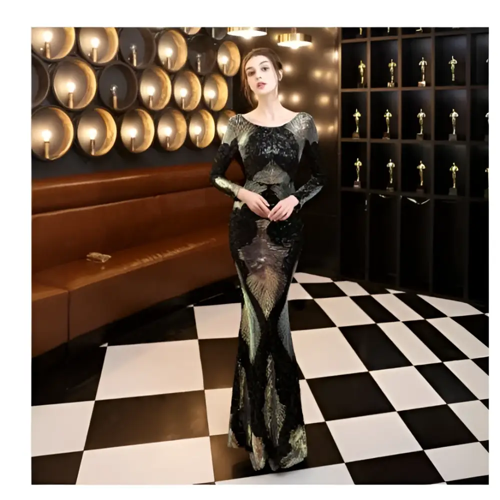 A shimmering black and silver long sequin dress with fashion stitching mopping in mermaid style and long sleeves