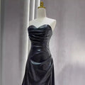 Black satin strapless skirt evening gown with fitted bodice and flowing skirt for elegant evening wear